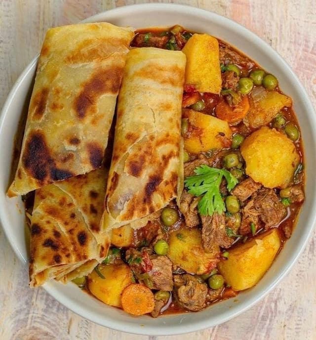 Chapati and Beef Peas Stew with Cabbage 
